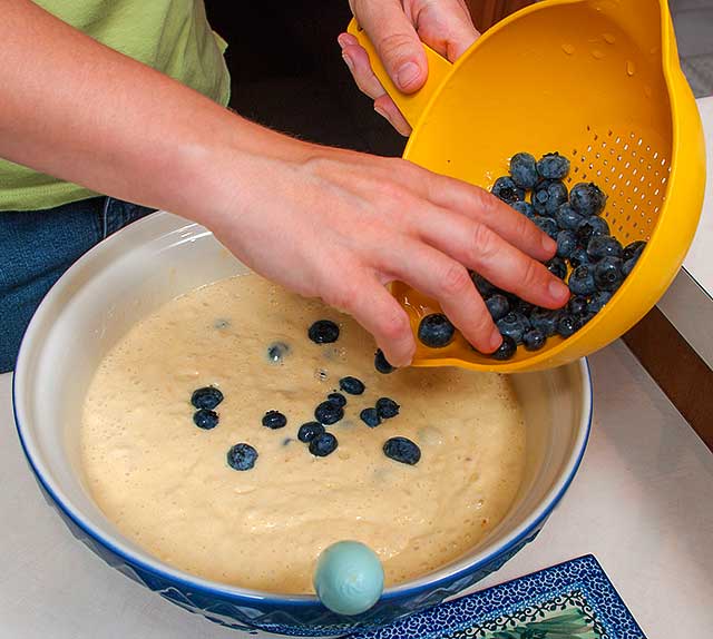 Add blueberries to the pancake batter