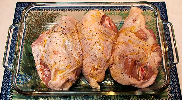 Chicken breast drizzled with olive oil, salt and pepper