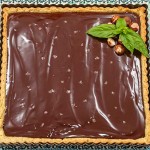 Dark Chocolate and Olive Oil tart with Basil, Hazelnut Crust