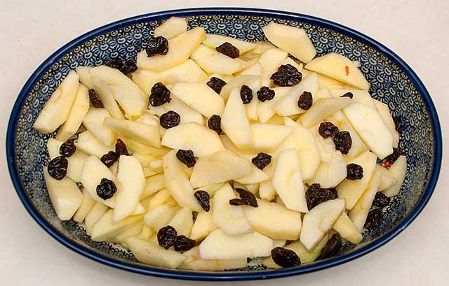 Sliced apples and dried cherries for apple crisp