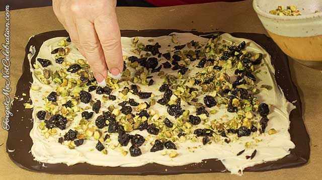 Adding toppings to the bark